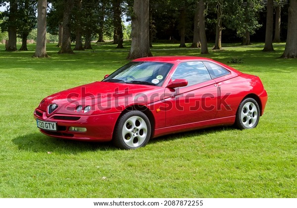 Longleat House, Wiltshire, UK\
- July 25 2004: An Italian made 1999 Alfa Romeo GTV (Gran Turismo\
Veloce) (Phase 2) 2+2 Coupe sports car. Registration Number T20\
GTV