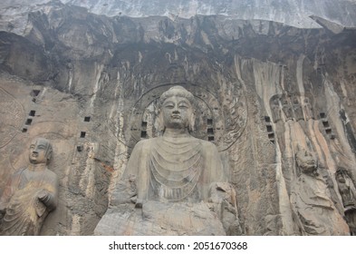 LONGMEN GROTTOES, CHINA - JANUARY 10, 2017: The Chinese Buddhist historical art statues in the area of Longmen caves, Luoyang