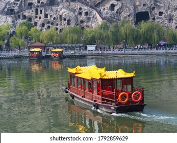 Longmen Grottoes World Heritage Site, The Boat Tour at The Longmen Caves along the Yi River near Luoyang in Luoyang City, Henan Province, China, 14th October 2018.