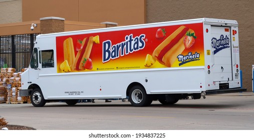 Longmont, CO USA - March 12, 2021: Marinela brand Barritas food delivery truck. Barritas are a delicious cookie bar filled with different fruity jams. Mexican food brand                               