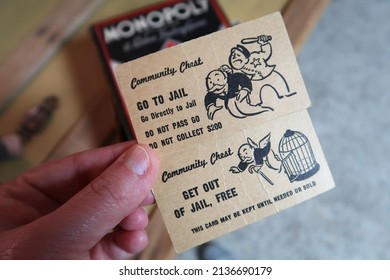 Longmont, CO USA - March 12, 2022: Vintage Monopoly Game Box Set. Community Chest Cards. Go To Jail. Do Not Pass Go. Do Not Collect $200. Get Out Of Jail Free.