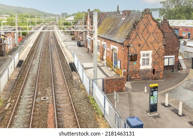 Longport, Stoke on Trent United kingdom June 08 2022 Longport train station taken from above showing railway tracks and platform one and two deserted of passengers
