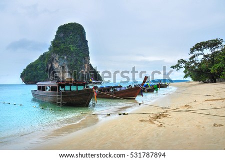 Foto Bild Longtail am Strand