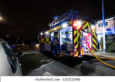 Longton, Stoke On Trent, Staffordshire - 16th February 2019 - Fire Engines And Firemen Attend An Emergency House Fire On A Quiet Housing Estate In The City Caused By A Fault Washing Machine Wiring