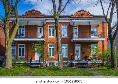 Longueuil, Qc, Canada - May 17th 2020: Beautiful Example Of French Canadian Traditional Housing (called Duplex) On The Longueuil Street In The Historic Center Of Old Longueuil (Quebec, Canadian)