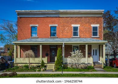 Longueuil, Qc, Canada - May 17th 2020: Beautiful example of French Canadian traditional housing (called duplex) on the Labonte street in the historic center of old Longueuil (Quebec, Canadian)
