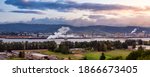 Longview, Washington, United States of America. Aerial Panoramic View of Port, Industrial Sites and Lewis and Clark Bridge over Columbia River. Sunrise Sky