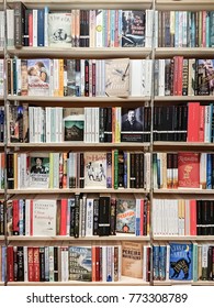 LONON, UK - 11 DECEMBER 2017: Book Shop. Full Frame Image Of Classic And Modern Fiction Paperback Books And Novels On The Shelves Of A Book Store.