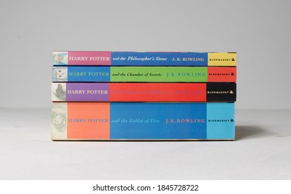 Lonond, Uk, 05/05/2020 A Collection Of Harry Potter Books, The Philosophers Stone, The Chamber Of Secrets, Prisoner Of Azkaban And The Goblet Of Fire, On A White Rustic Background. Childhood Books.