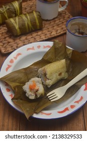 Lontong Buras (Burasa) With Tea On The Table 