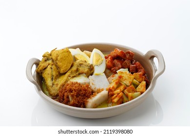 Lontong Cap Go Meh, Indonesian Lontong Sayur with Chinese Peranakan Influence. Isolated on WHite Table