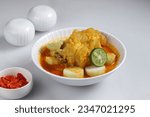 Lontong Kikil is Traditional Indonesian Food from Surabaya Jawa Timur, Made From Beef Legs and Rice Cake.