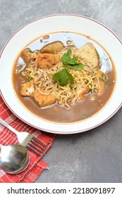 Lontong Mie Surabaya Served In White Plate. Lontong Mie Is A Traditional Indonesian Food 