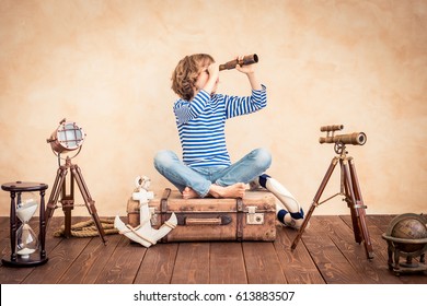 Look Ahead! Child Pretend To Be Sailor. Kid Having Fun At Home. Summer Vacation And Travel Concept