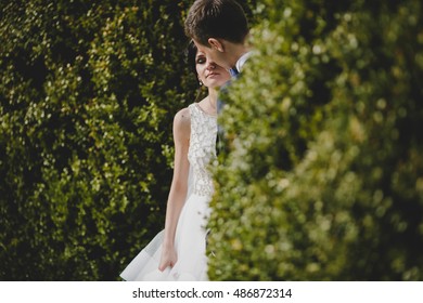 Look From Behind The Bush On Daydreaming Bride