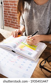 Look At Calendar Schedule Agenda Or Organizer At Desk