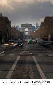 Look At The Champs Élysées And The Arc De Triomphe At The Bottom With So Much Traffic At Midday In Paris, France.