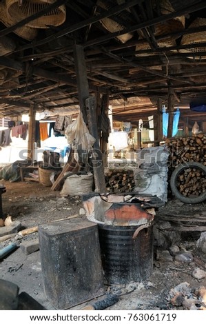 A look at the interior of a workshop where both goods and food are produced for locals in the town of Tachileik, in the Republic of Myanmar (Burma).