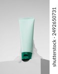 Look up at the light green skin care product foam facial cleanser