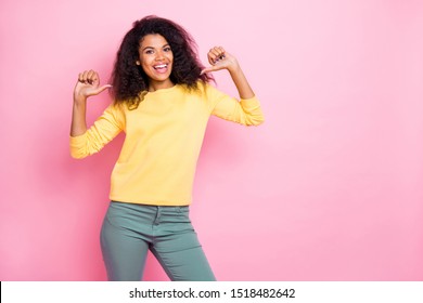 Look at me! Photo of pretty optimistic in good mood nice glad in pants adorable pretty active volunteer teen girl demonstrating her energetic character pointing thumb at herself isolated background