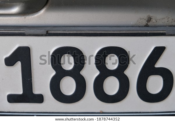 look at the\
numbers on a car registration\
plate