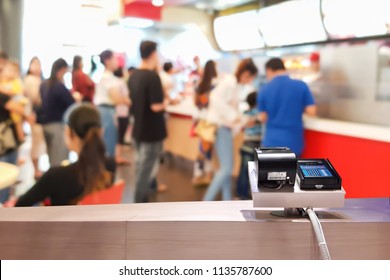 Look Out Of The Counter, Blur Image Of Fast Food As Background.