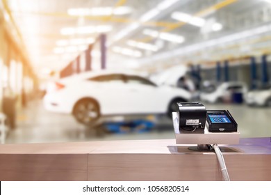 Look Out From The Payment Counter, Blur Image Of Blur Image Of Car Service As Background.