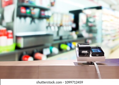 Look Out From The Payment Counter, Blur Image Of Inside The Convenience Store As Background.