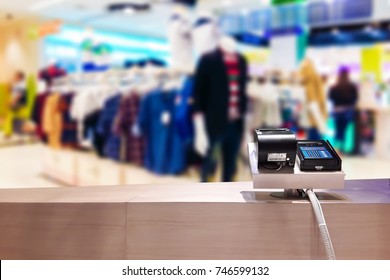 Look Out From The Payment Counter, Blur Image Of Clothing Store In Department Store As Background.