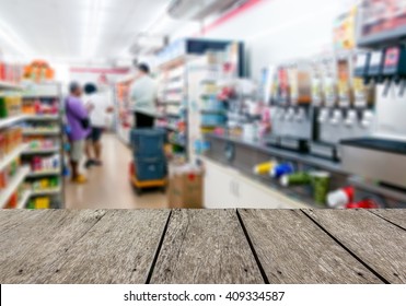 Look Out From The Table, Blur Image Of Inside Convenience Store As Background.