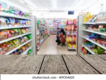 Look Out From The Table, Blur Image Of Inside Convenience Store As Background.