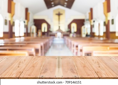 Look out from the table, blur image of inside the church as background.