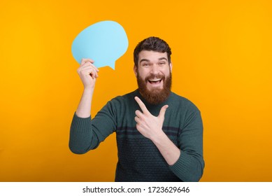 Look at this blue bubble speech is saying an excited bearded man. - Shutterstock ID 1723629646