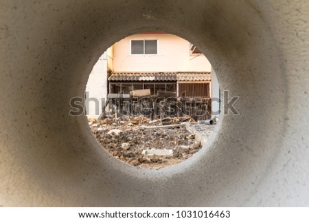 Similar – Image, Stock Photo Look through stone pipes with resistant glaze placed on the ground in front construction site