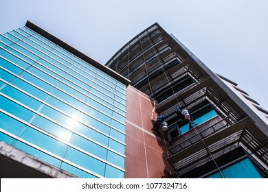 Look Up! You Must Be Careful. I'm Going To Study I Hear Those Guy Talking About Hight And Very Tired When They're Working Outside The Building Like This.