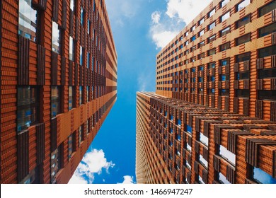 Look Up View On Orange Skyscrapers In Amsterdam Business District