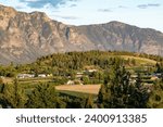 Looking across the Creston Valley at the Skimmerhorn range of the Purcell Mountains on a summer evening, British Columbia, Canada