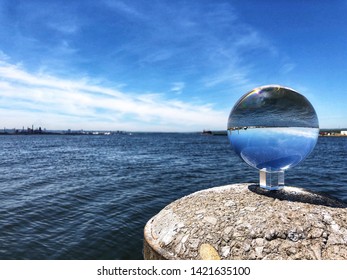 Looking Across Hamilton Harbour At The West End Of Lake Ontario, With A Crystal Ball As An Eye-catching Prop.