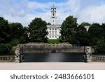 Looking across Highfields lake towards Nottingham university..Trent Building. Blue cloudy day