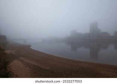 Looking across the Thames through a thick layer of fog