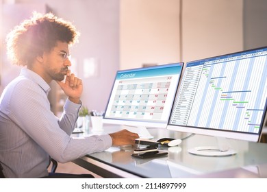 Looking At Agenda Plan On Multiple Screens. Checking Planner