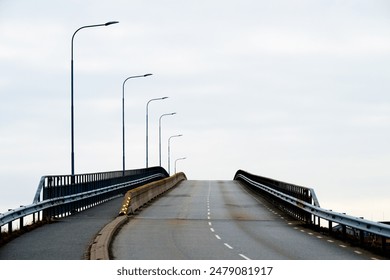 Looking up a arched bridge