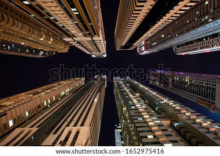 Looking up between skyscraper in Dubai