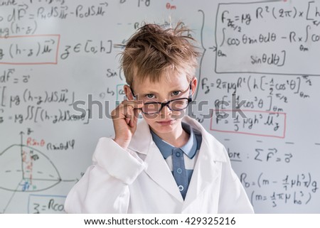 Similar – Image, Stock Photo Little boy looking at camera through magnifying glass