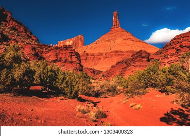 Looking up to Castle Rock, also called Castleton Tower, a large sandstone pillar in the town of Castle Valley, located on the Colorado River northwest of Moab, Utah, United States.