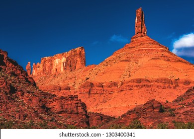 Looking up to Castle Rock, also called Castleton Tower, a large sandstone pillar in the town of Castle Valley, located on the Colorado River northwest of Moab, Utah, United States.