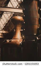 Looking Up At A Column Pot Still In A Whiskey Distillery.