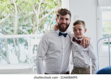 Looking dapper with Daddy. Portrait of an adorable little boy and his father dressed in matching outfits at home.