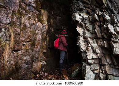 Looking in to the dark void of a cave