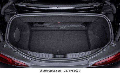 Looking down at a car trunk open